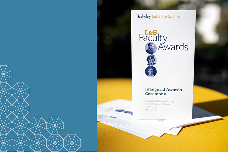 L&S Faculty Awards program standing on a tabletop