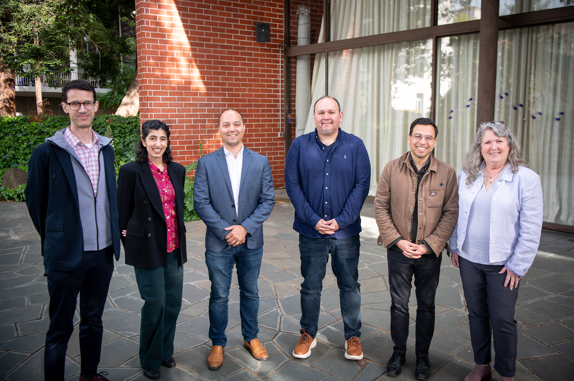 Group of six faculty awardees standing outside