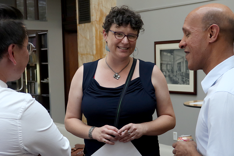 Guests talking at a reception