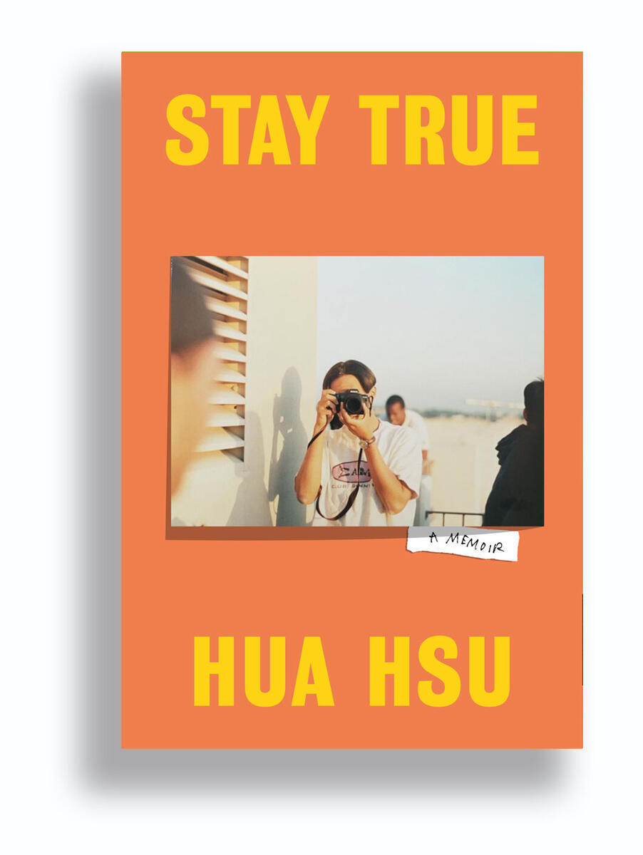 Stay True book cover - orange with a photo in the middle of a student aiming a camera