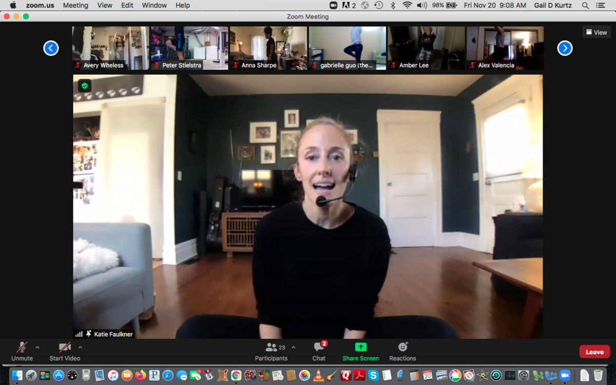 Screen grab of dance instructor on Zoom, with class attendees along the top of the screen