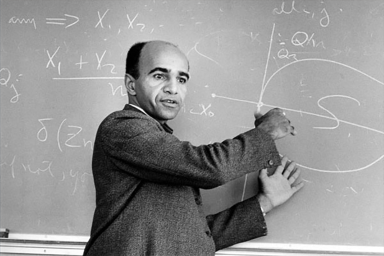 Image of David Blackwell teaching in front of a chalkboard