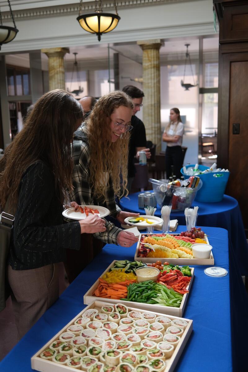 Math on Tap guests serve themselves refreshments.