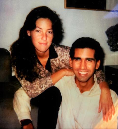 Liza Wachter and Henry Ramos smile at camera (circa 1985)