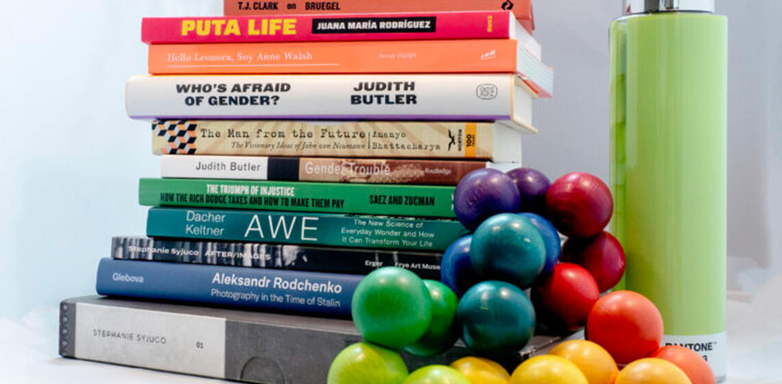 a stack of about a dozen books by UC Berkeley authors