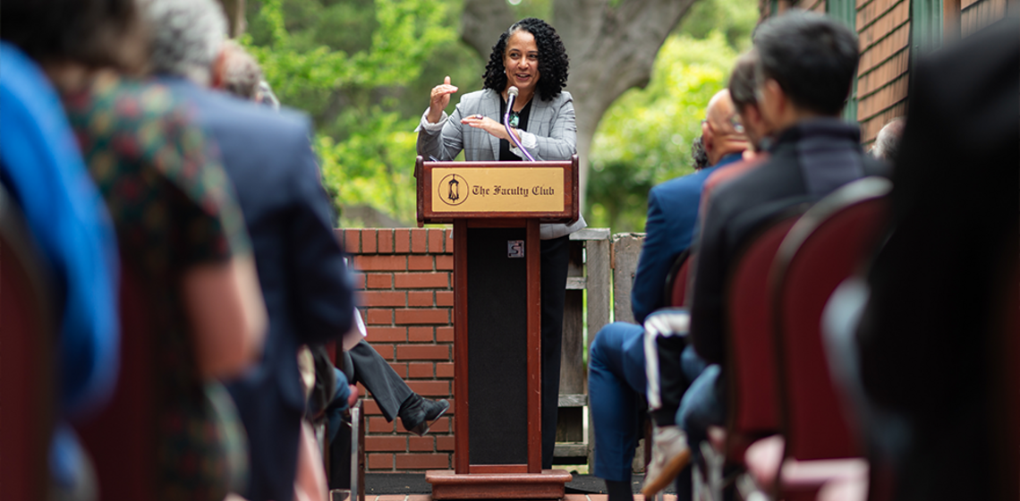 Woman speaking at podium