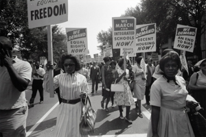 Black marchers holding signs for civil rights 