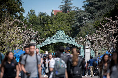 Sather Gate with students in foreground